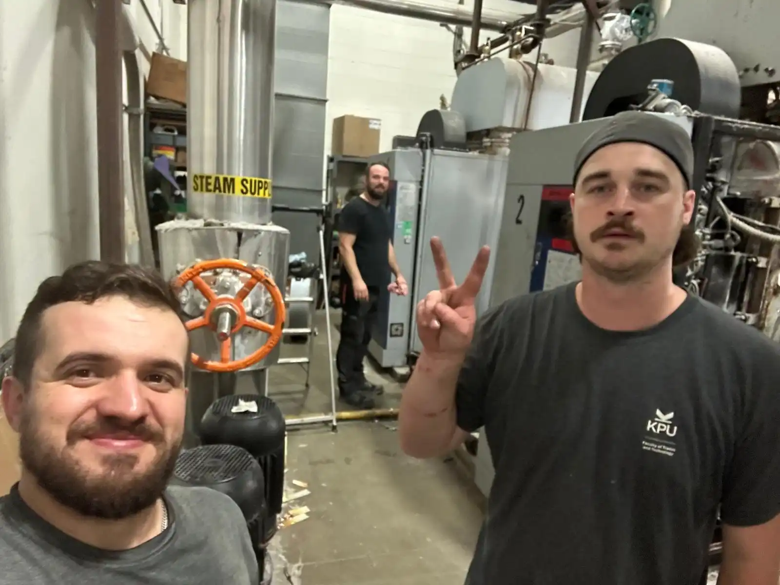 Stanislav Vavroušek s kolegy v kanadské kotelně ve Vancouveru